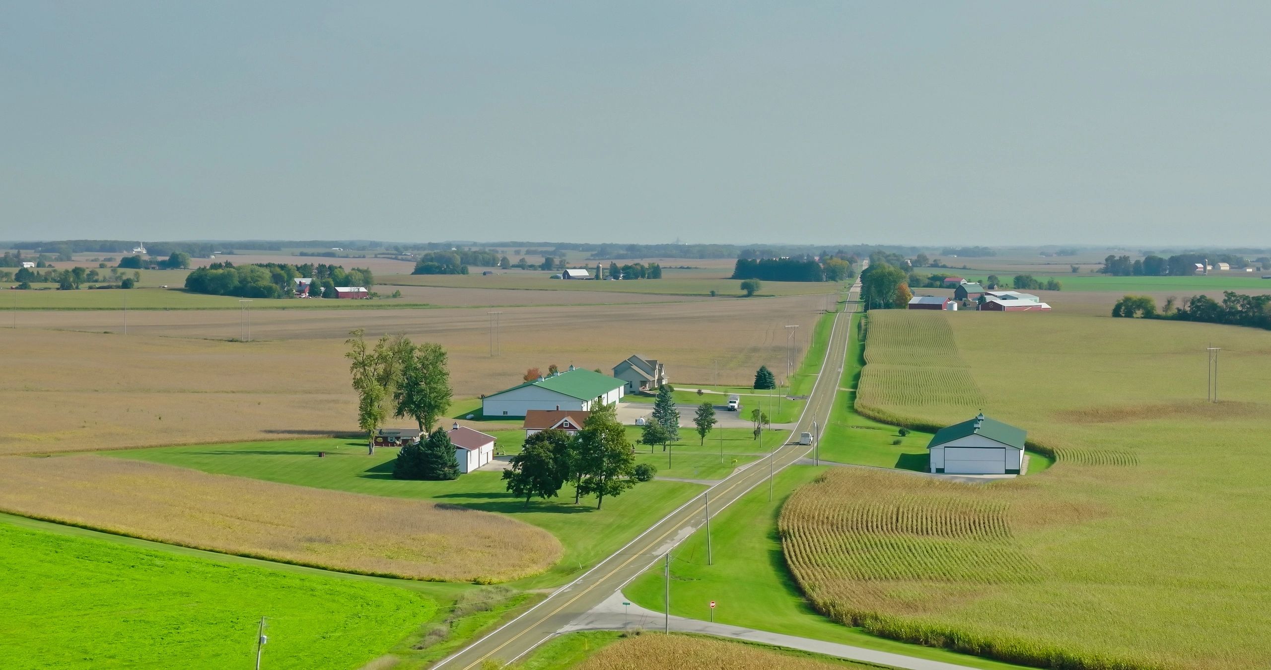 Country road and farmland near a Wisconsin community